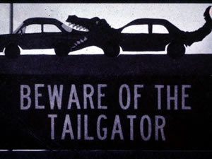 beware of tailgating sign
